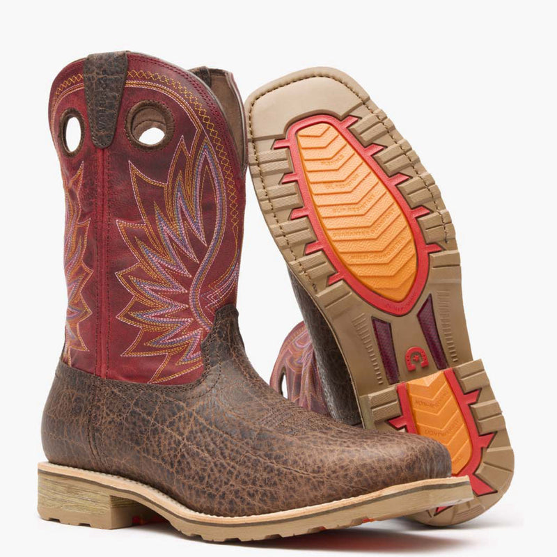 Front view of a pair of Durango Maverick Pro work boots with elephant embossed brown leather and red shaft design and outsole showing