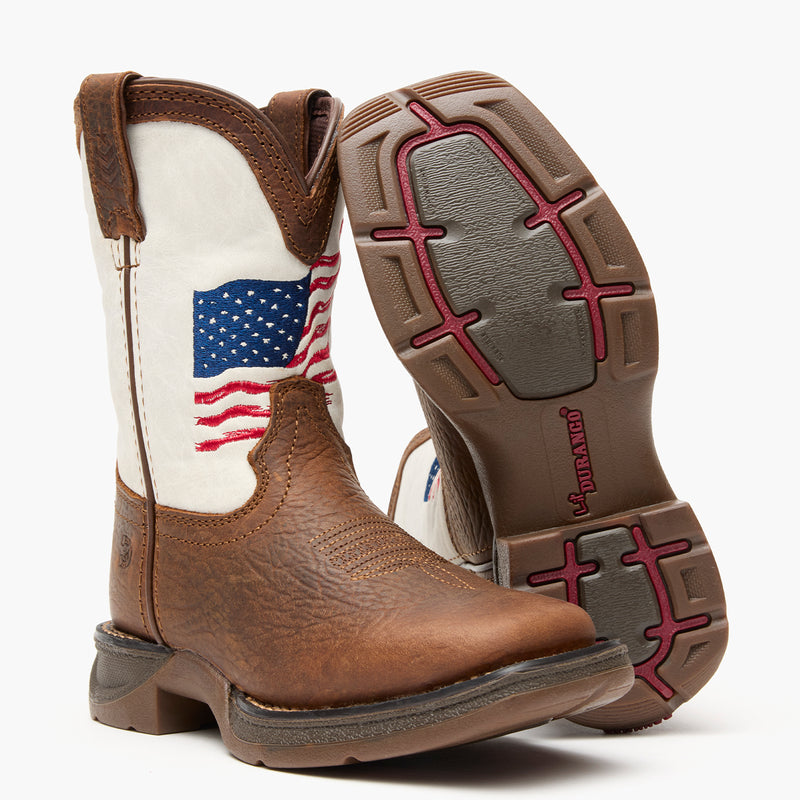 Brown and white kids western boot with American flag design on a grey background