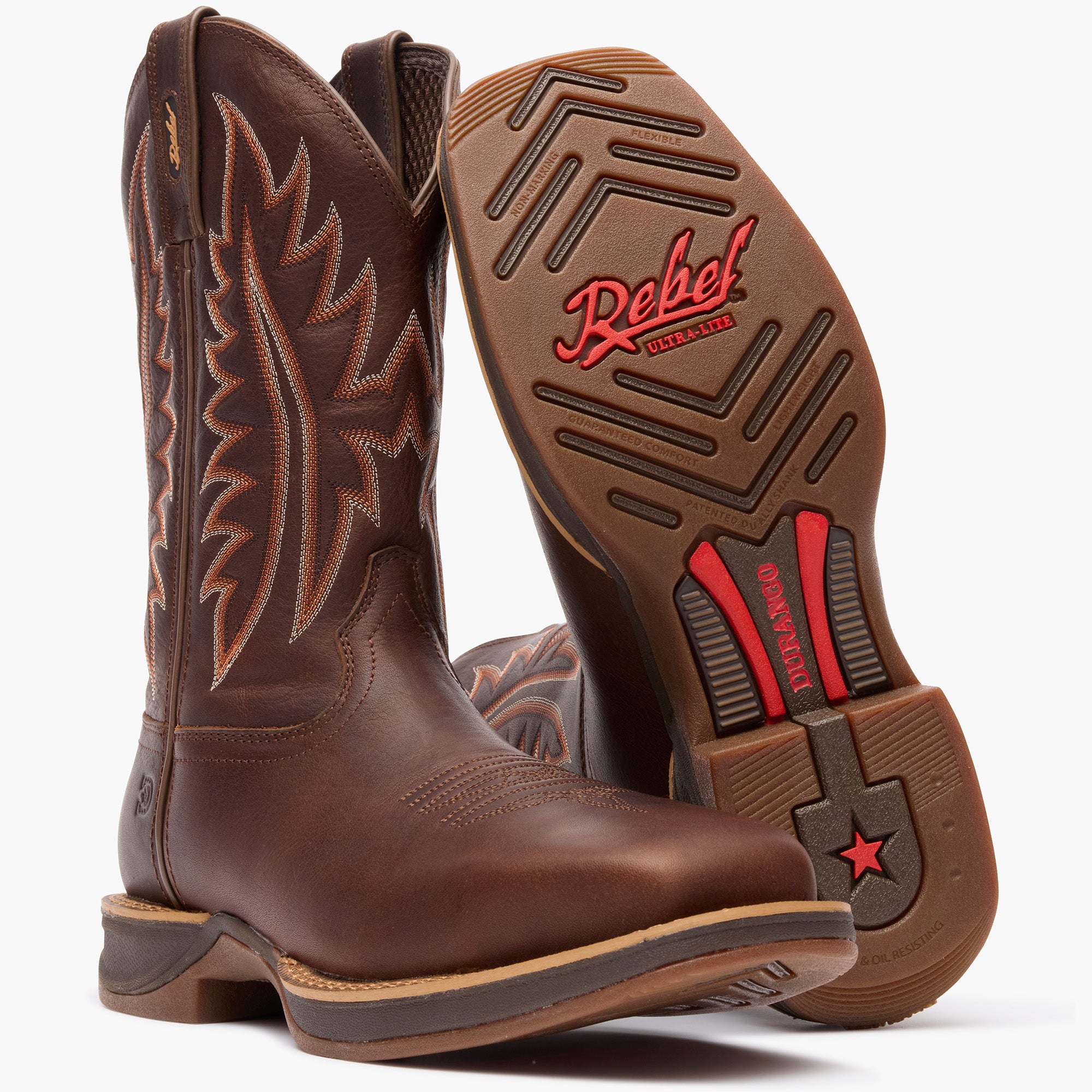 Front view of a pair of Durango Rebel Ultra Lite brown square toe western boots with outsole showing