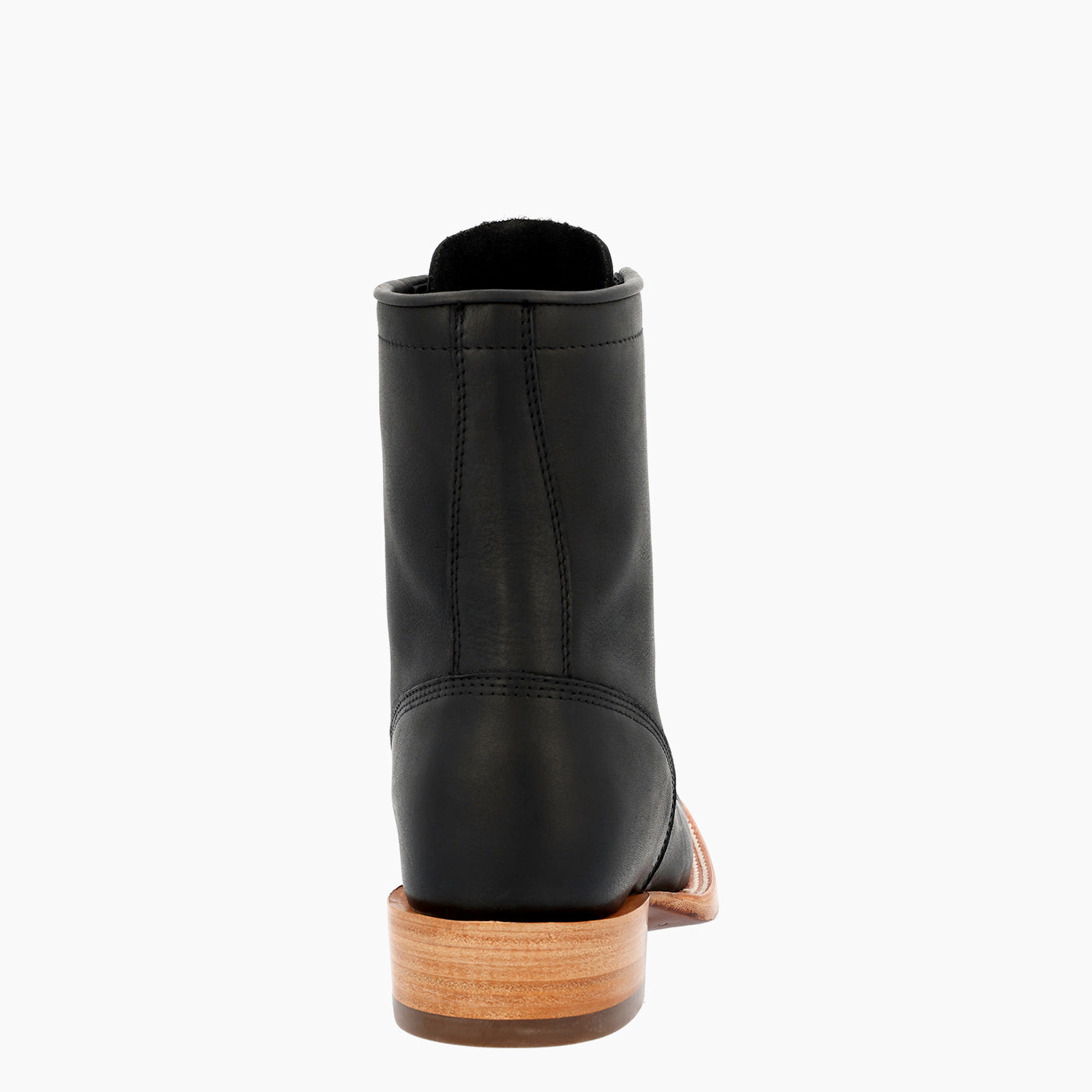 A black leather ankle boot shown from a rear three-quarter view, featuring a light brown leather block heel and a black interior lining, set against a plain white background.