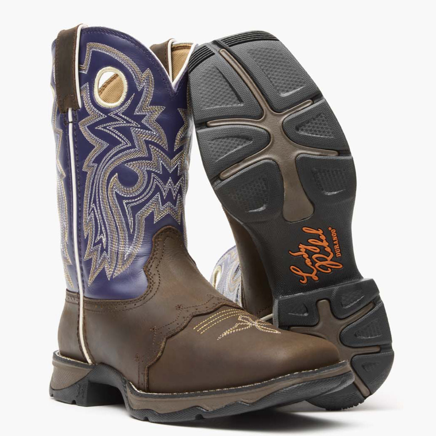 Front pair view of Durango Lady Rebel Brown and Purple western boots with outsole showing