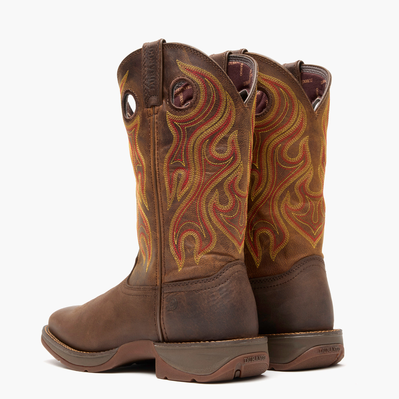 Back pair view of Durango Rebel brown square toe leather western boots with rubber outsole