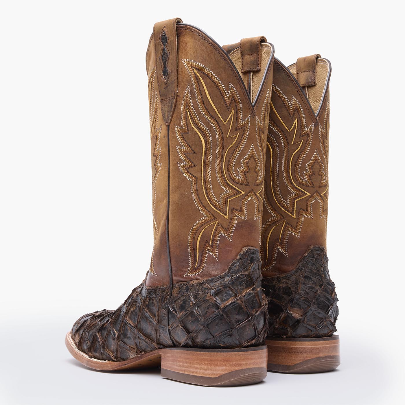 Back view of a pair of Durango brown square toe Pirarucu fish western boots