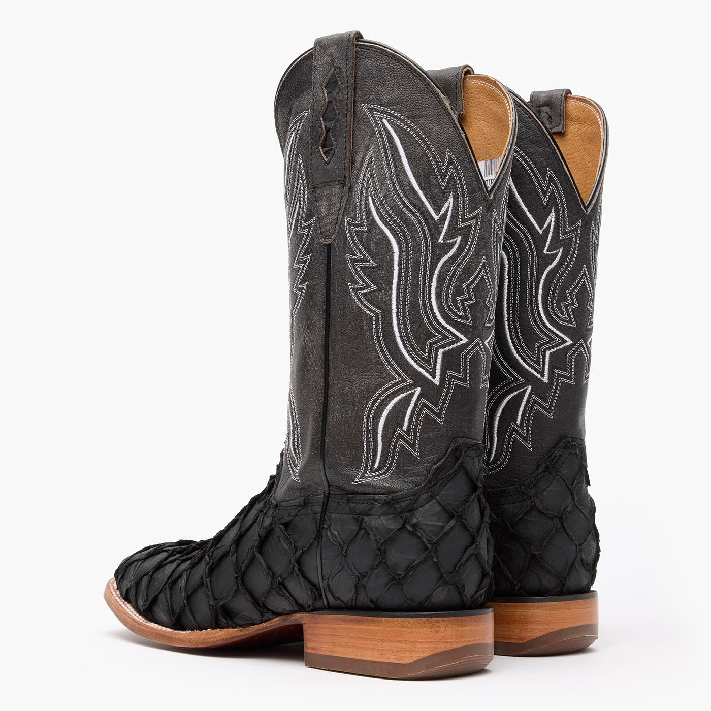 Back view of a pair of Durango black square toe Pirarucu fish western boots