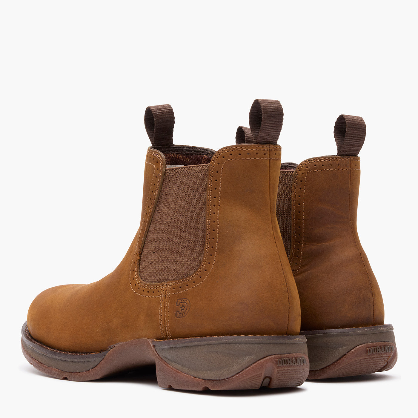 Back view of a pair of Durango Red Dirt Rebel brown round toe chelsea boots