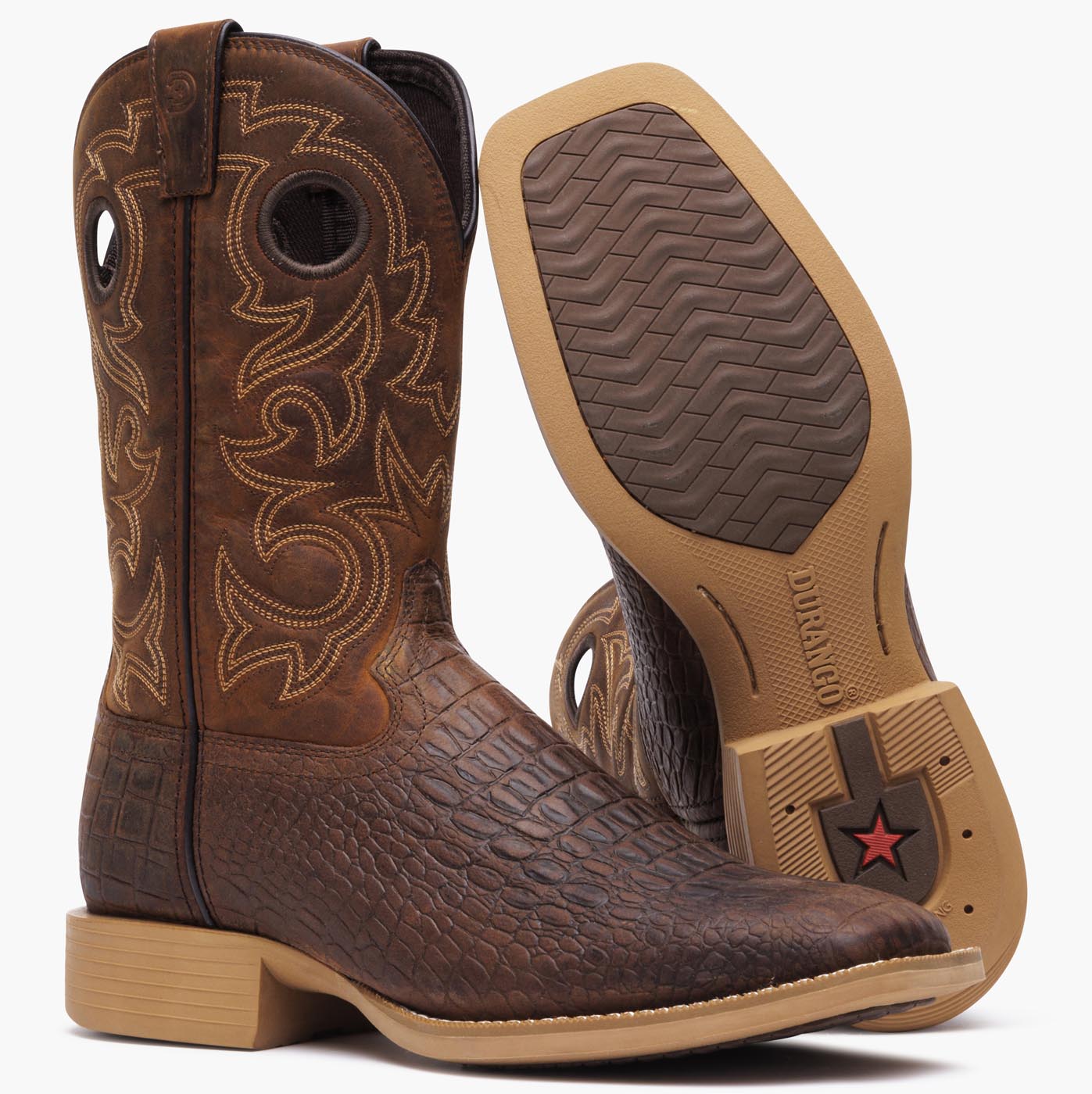 Front outsole view of a pair of Durango brown crocodile print cowboy boots