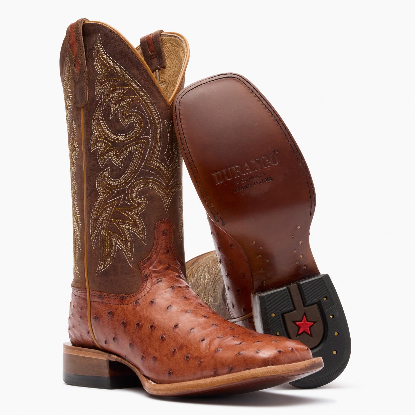 Outsole view of a pair of Durango Premium Exotic brown square toe Ostrich western boots