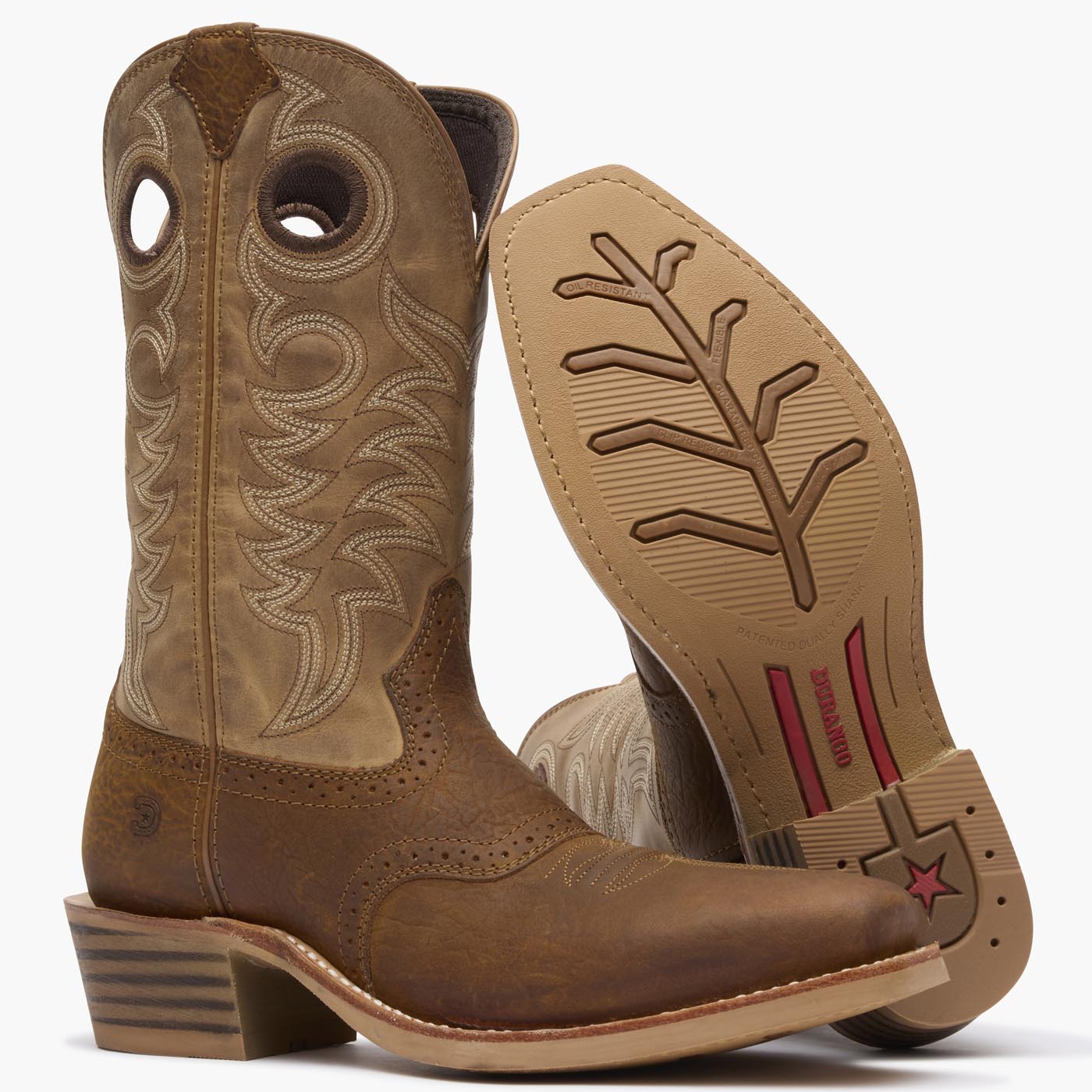 Front pair view of Durango Rebel Pro men's brown cowboy boots with rubber outsole showing