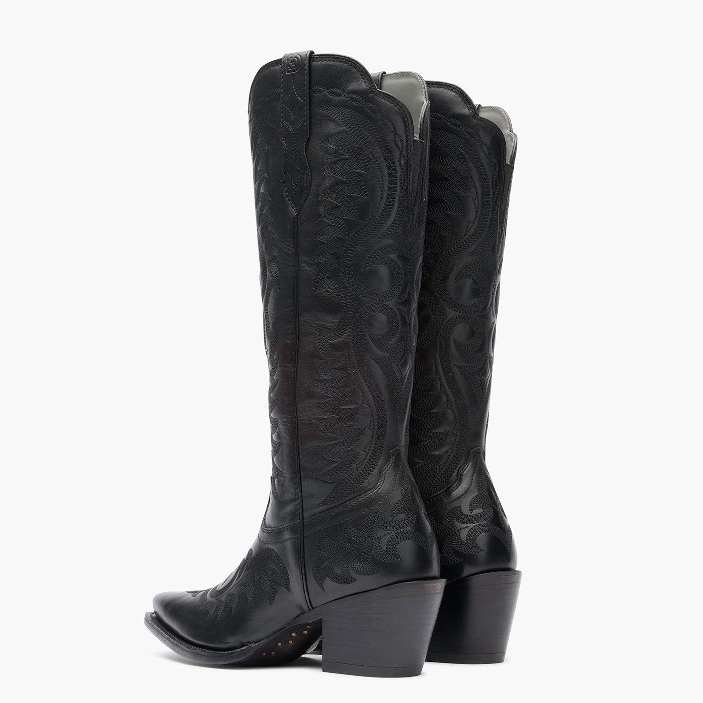 Back view of a pair of Durango black cowgirl boots with black stitching.
