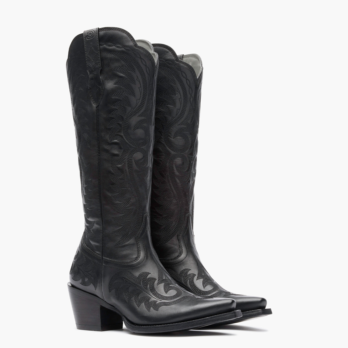 Front view of a pair of Durango black cowgirl boots with black stitching.
