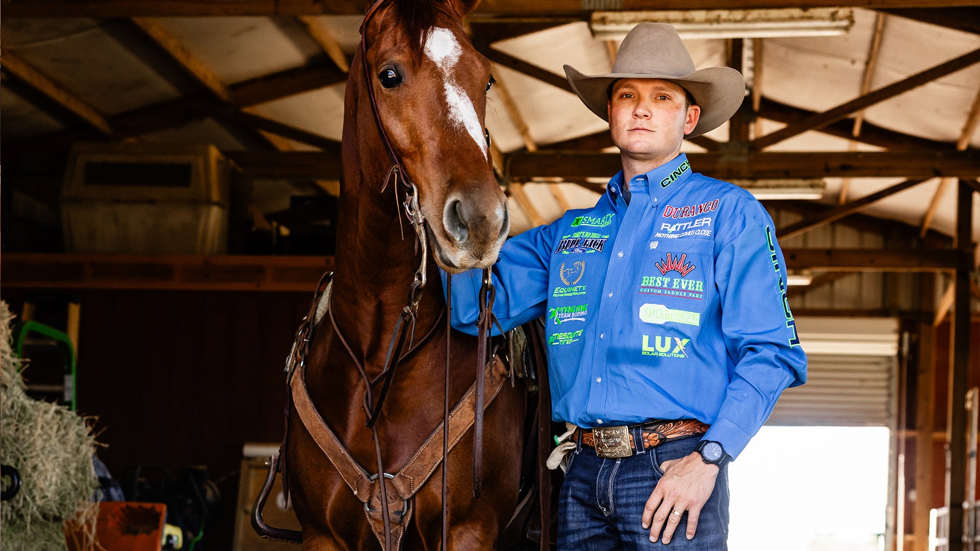 Hunter Koch, Team Roper, with his horse.